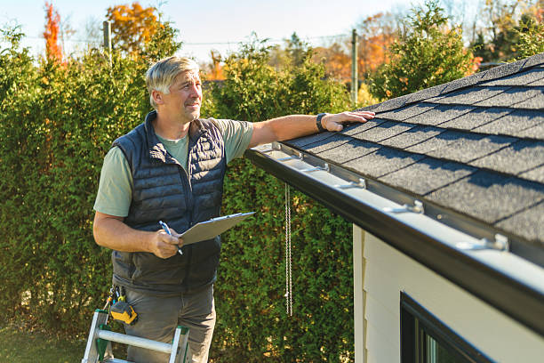 Professional Roofing technician working in Wall, SD